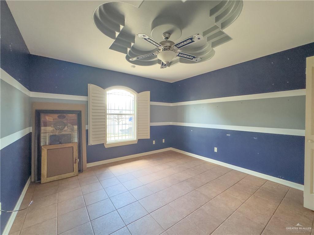 3909 Tulipan Street Mission, TX 78573 - Photo 12 of 18 a view of an empty room with a window
