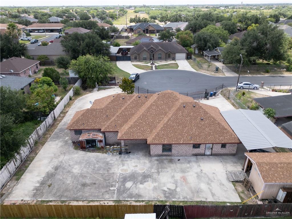 3909 Tulipan Street Mission, TX 78573 - Photo 14 of 18 an aerial view of a house with yard swimming pool and lake view