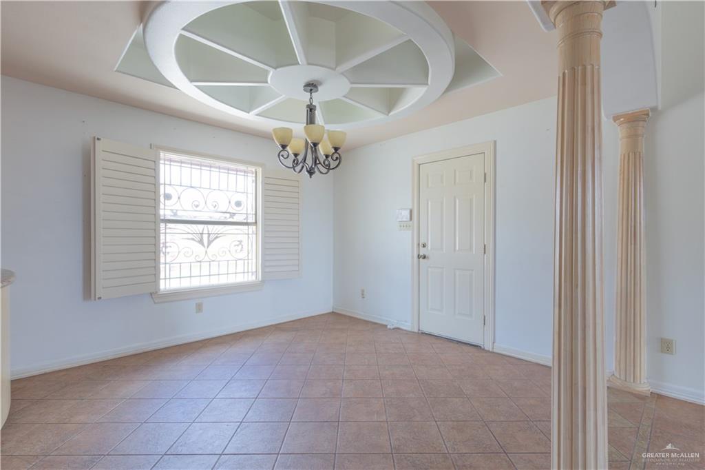 3909 Tulipan Street Mission, TX 78573 - Photo 8 of 18 a view of an empty room with a window