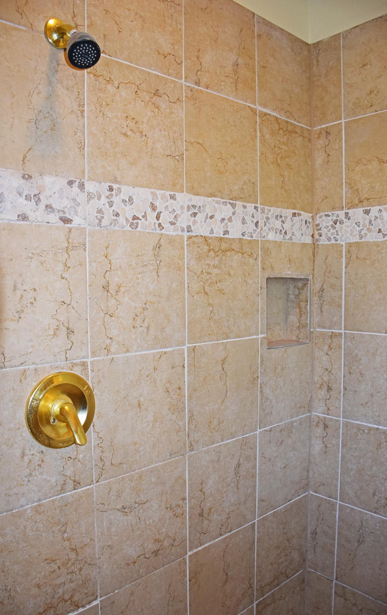 1828 Huntington Road Niceville, FL 32578 - Photo 18 of 27 a bathroom with a shower