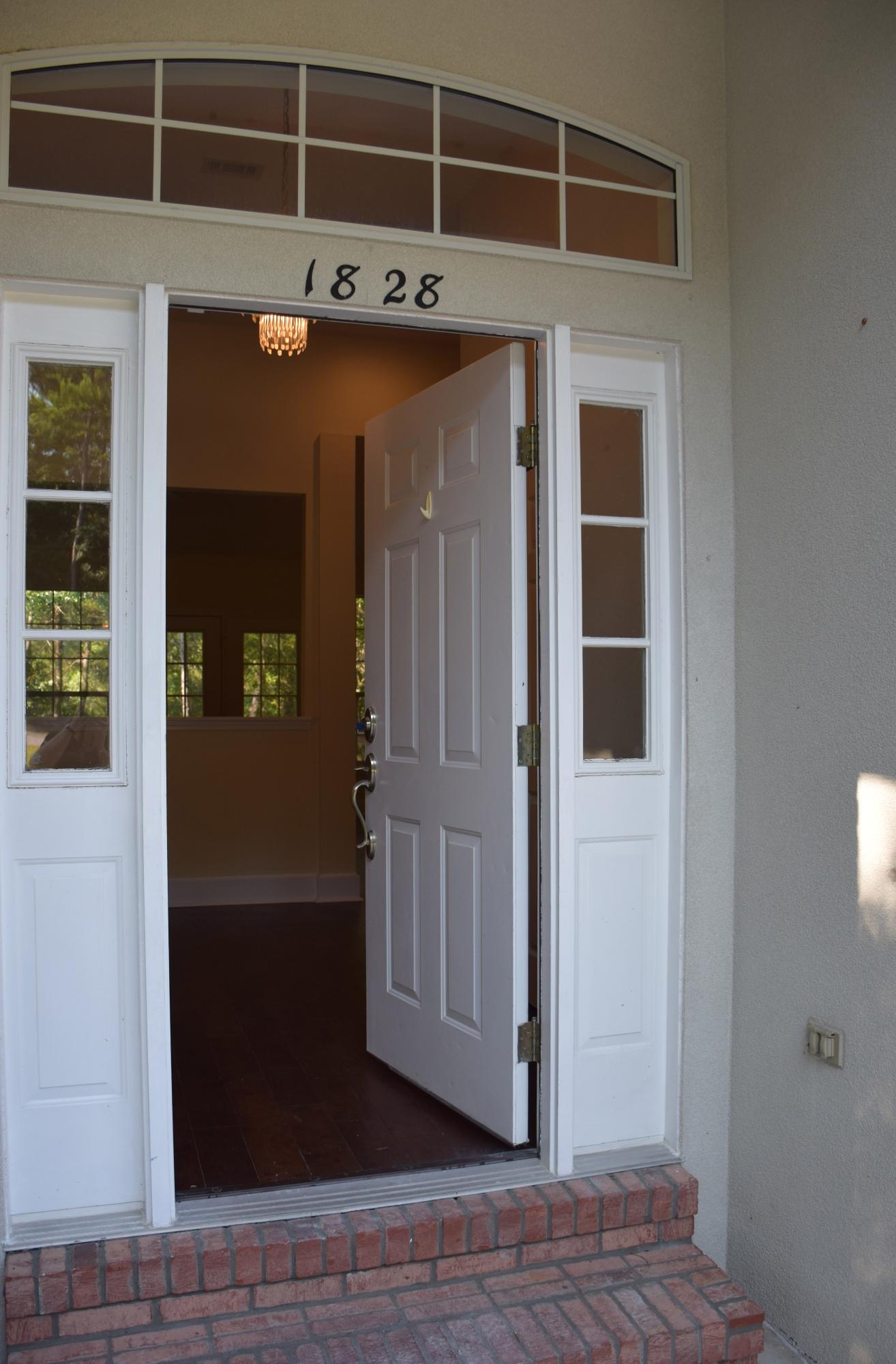 1828 Huntington Road Niceville, FL 32578 - Photo 2 of 27 a view of a wooden door