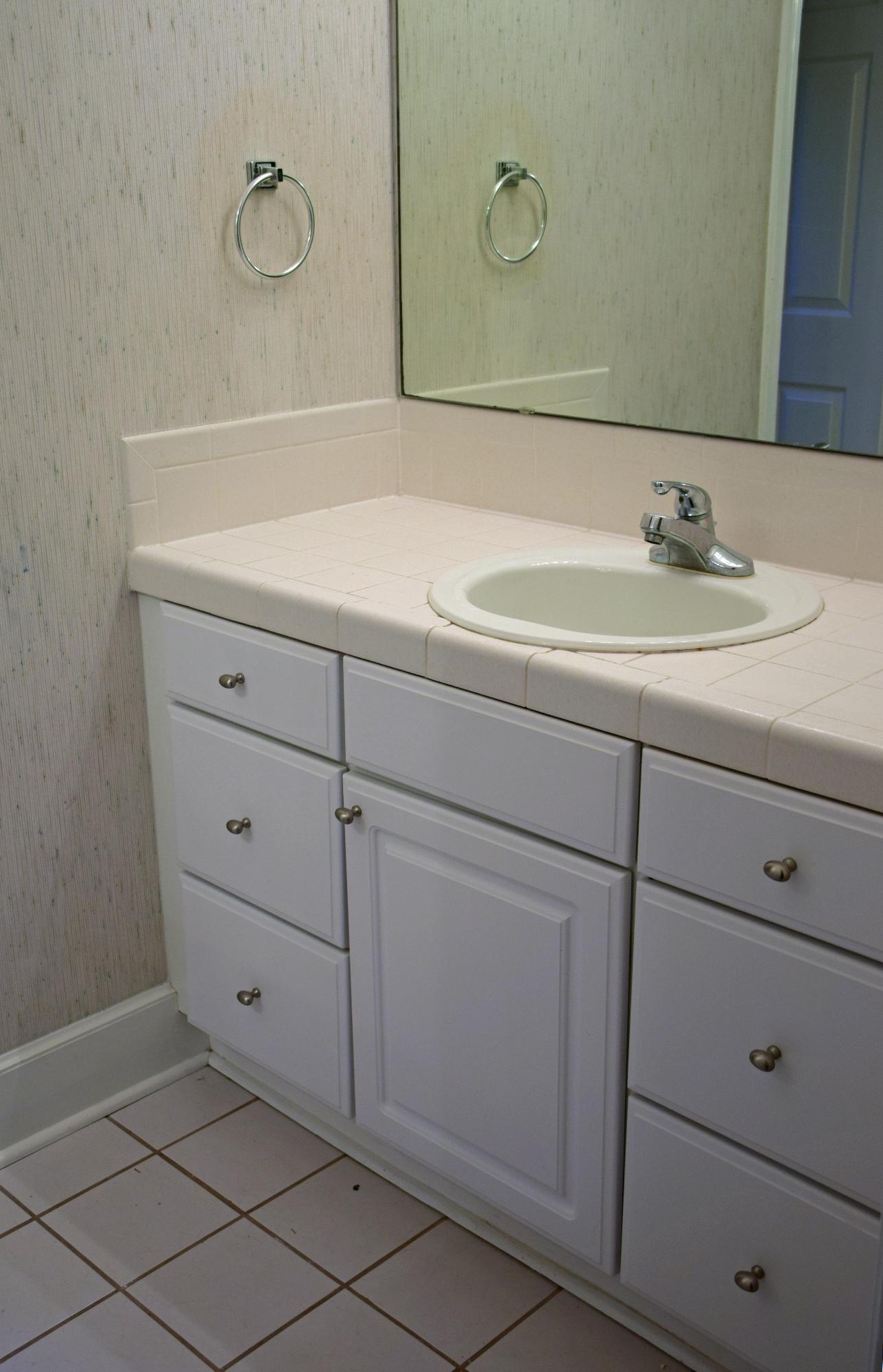 1828 Huntington Road Niceville, FL 32578 - Photo 21 of 27 a bathroom with a sink and a mirror