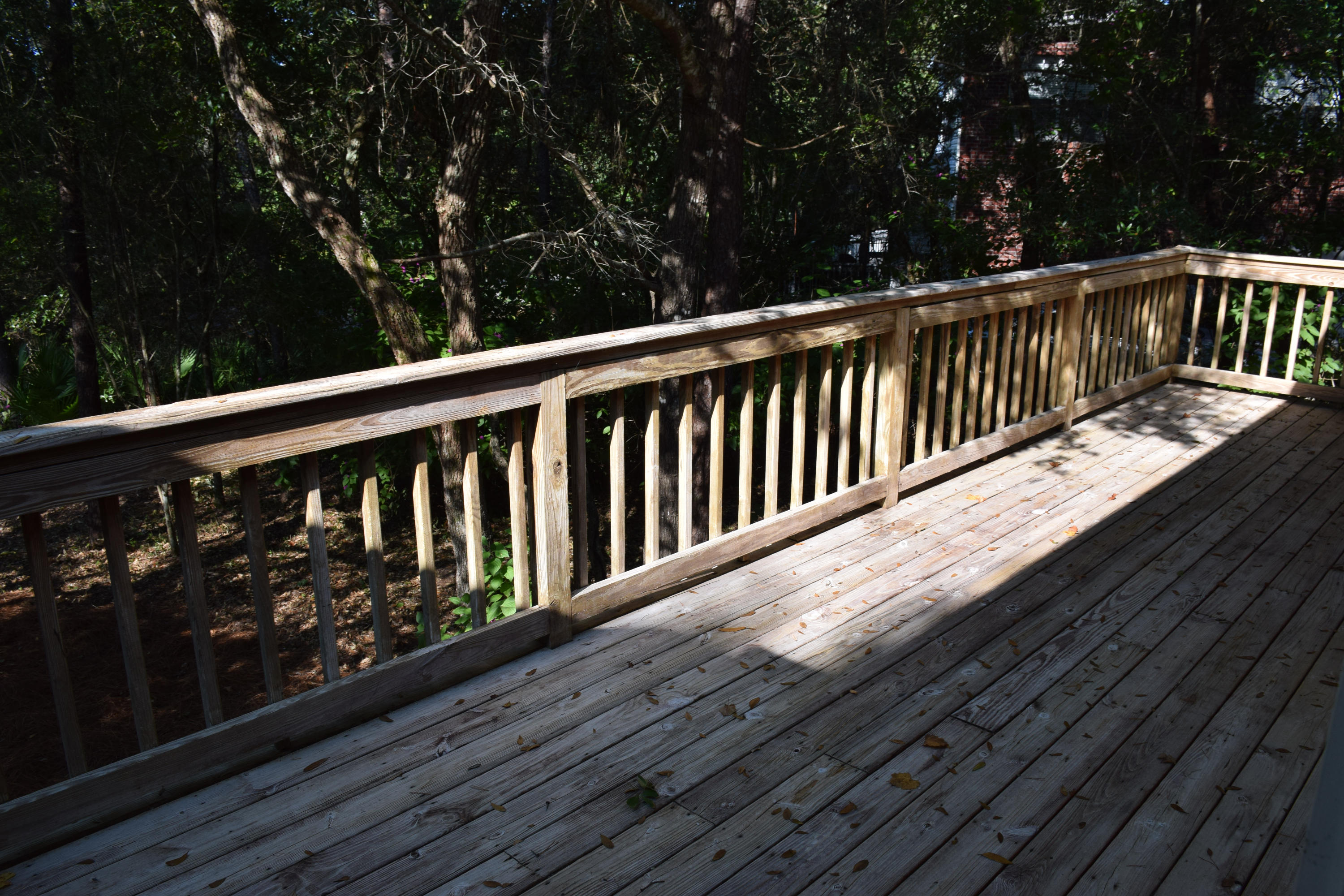 1828 Huntington Road Niceville, FL 32578 - Photo 23 of 27 a balcony with wooden floor