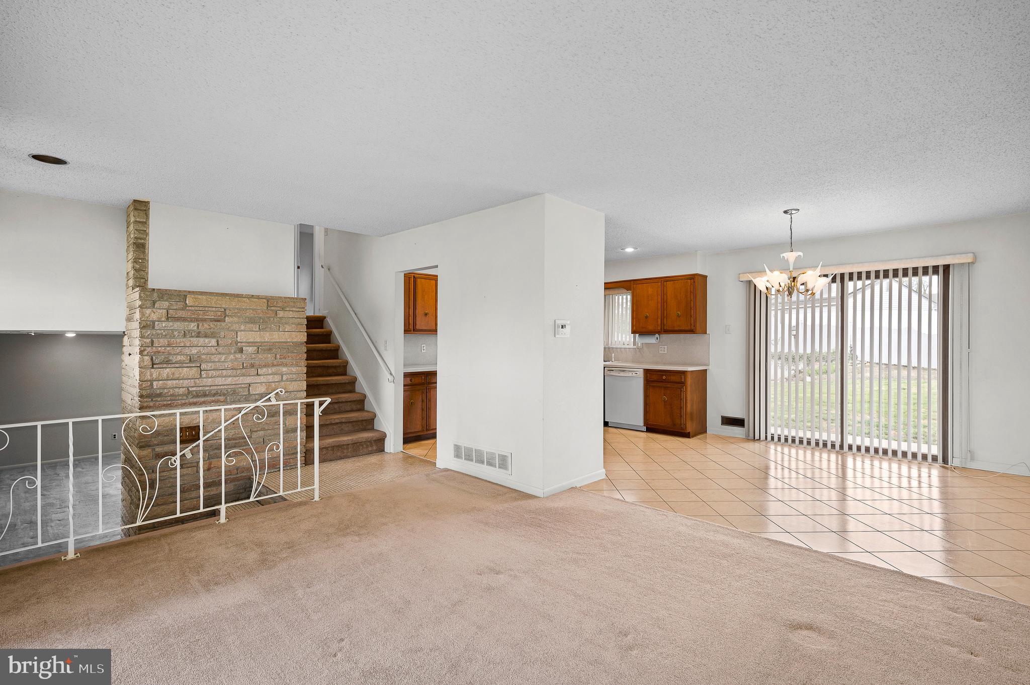 9 Stephen Drive Glendora, NJ 08029 - Photo 10 of 29 Open floorplan into the dining area