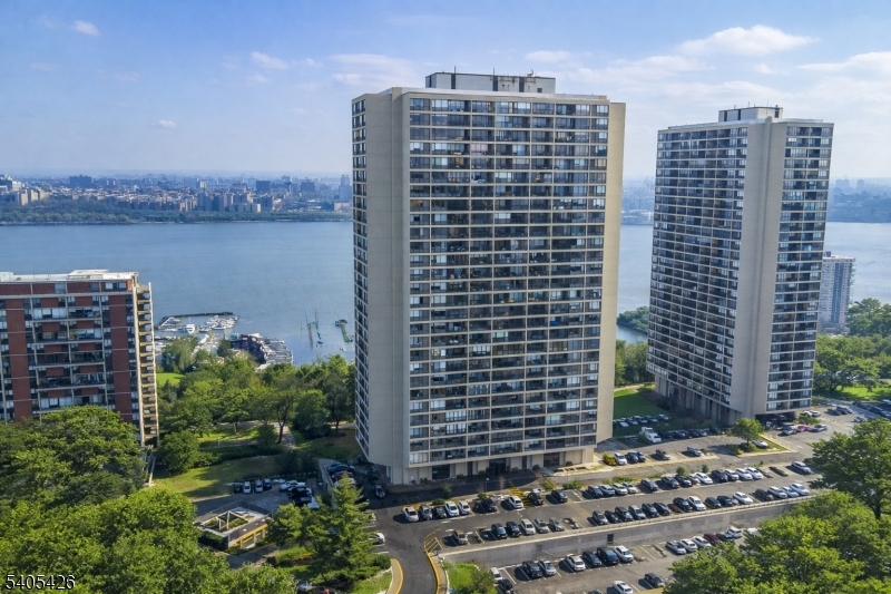 6 Horizon Road, Unit 2809 Fort Lee, NJ 07024 - Photo 17 of 19 a view of a building with a garden