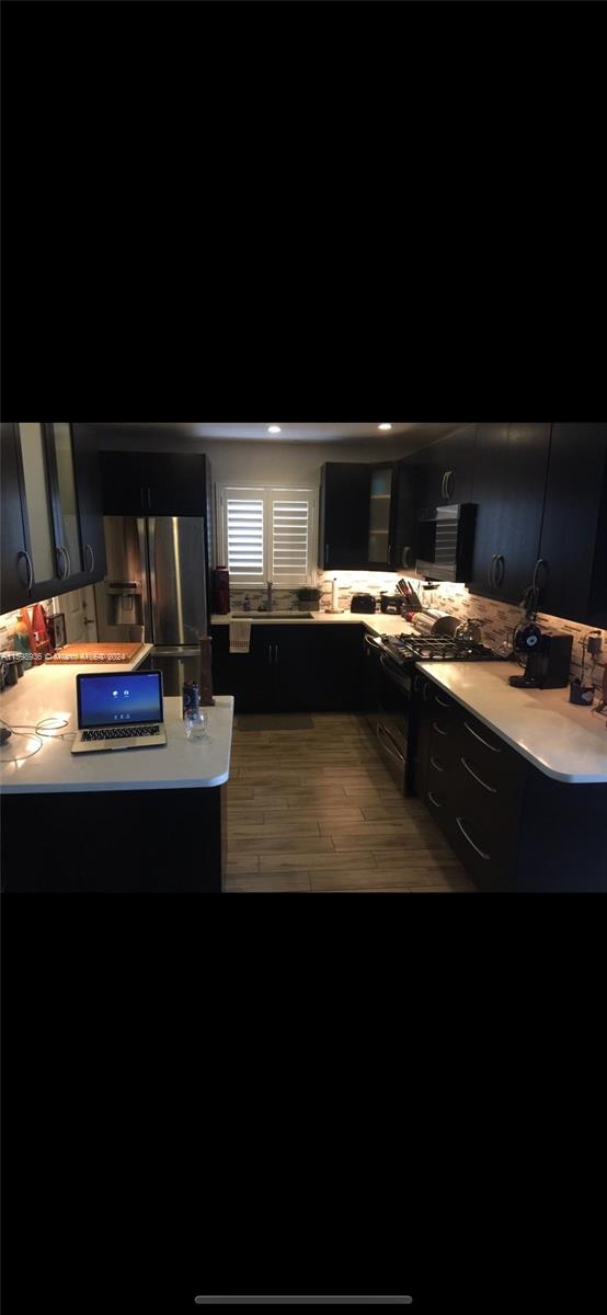 3121 Riverland Road Fort Lauderdale, FL 33312 - Photo 2 of 7 a view of a workspace with furniture