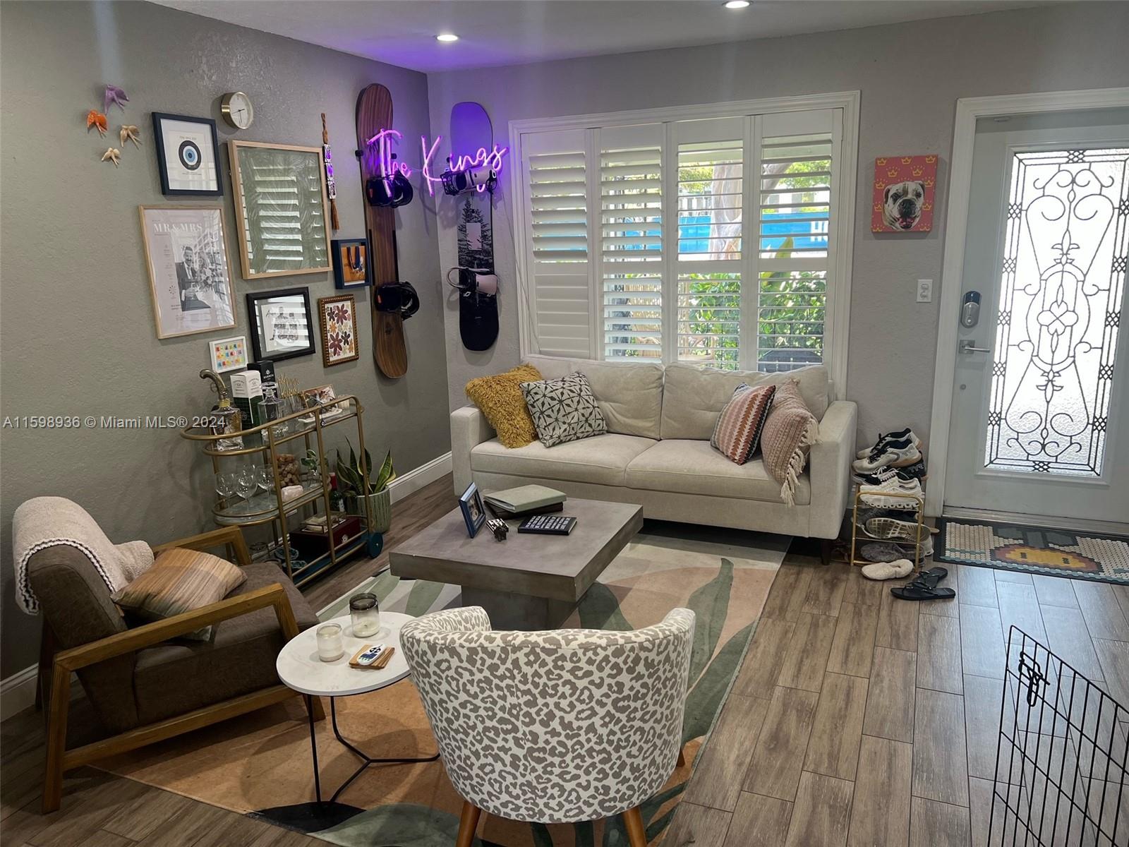 3121 Riverland Road Fort Lauderdale, FL 33312 - Photo 5 of 7 a living room with furniture and wooden floor