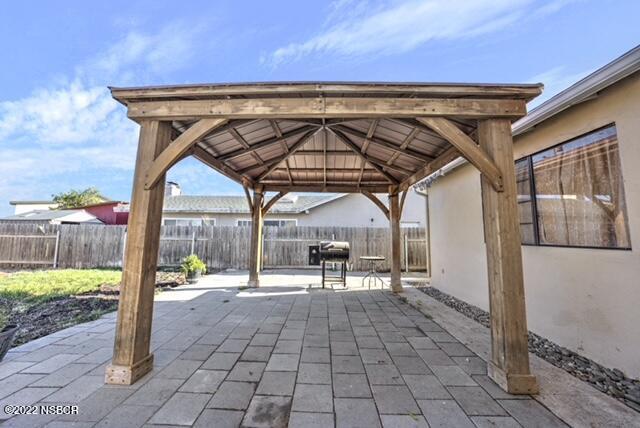 3436 Via Cortez Lompoc, CA 93436 - Photo 14 of 17 a patio with a table and chairs