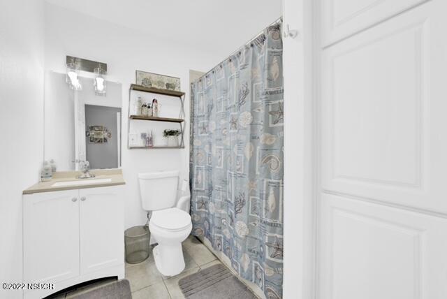 3436 Via Cortez Lompoc, CA 93436 - Photo 9 of 17 a white toilet sitting next to a bathroom sink
