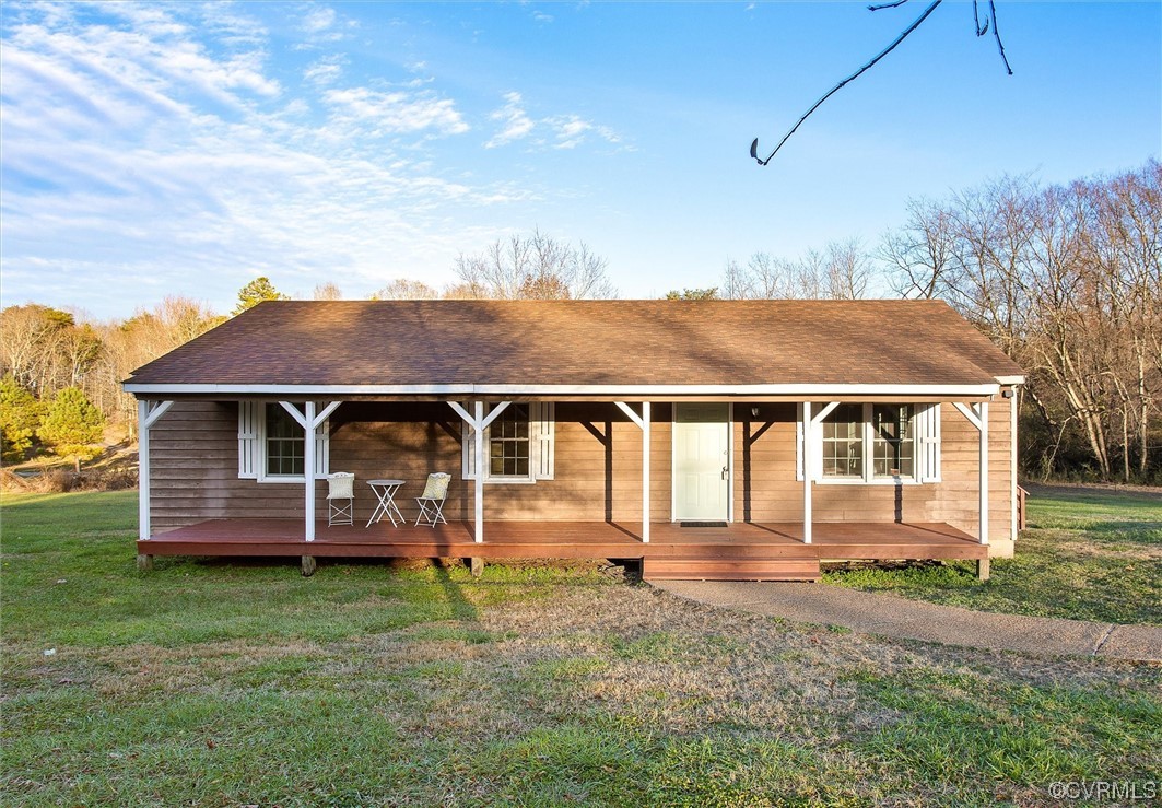 378 Three Chopt Road Manakin-Sabot, VA 23103 - Photo 1 of 34 front view of a house with a yard