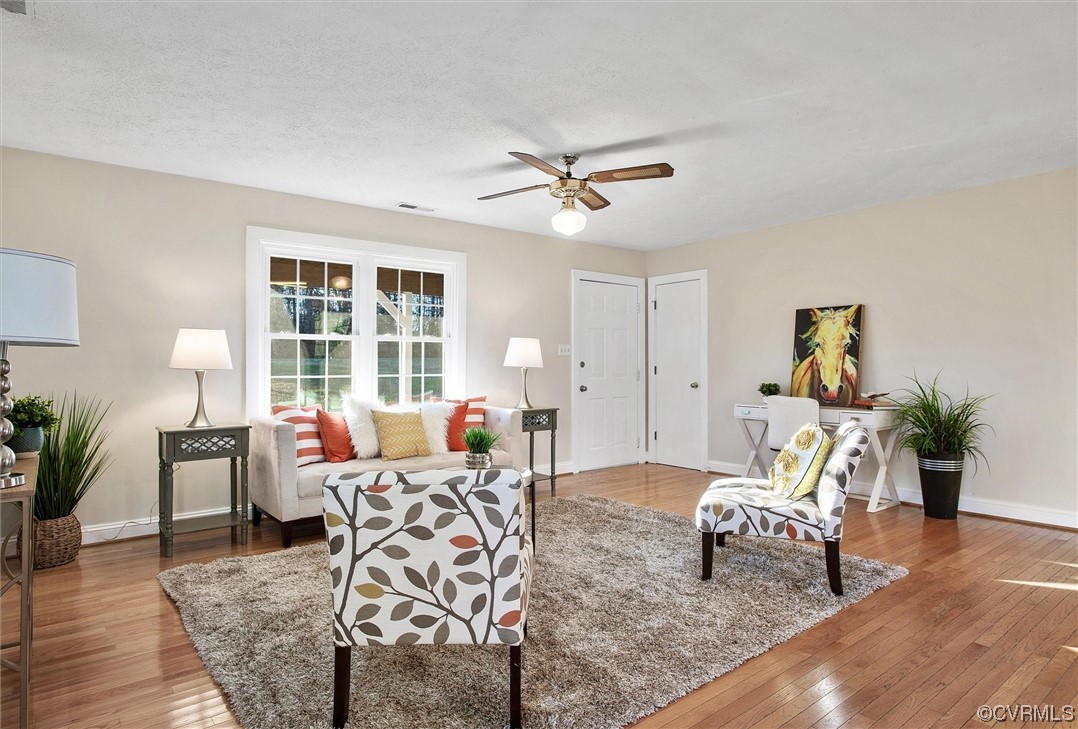 378 Three Chopt Road Manakin-Sabot, VA 23103 - Photo 11 of 34 a living room with furniture and wooden floor