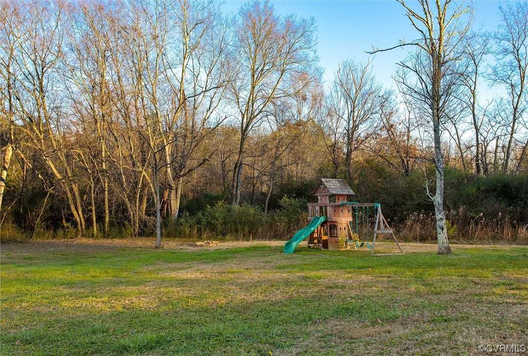 378 Three Chopt Road Manakin-Sabot, VA 23103 - Photo 29 of 34 a view of a park with swings and slides