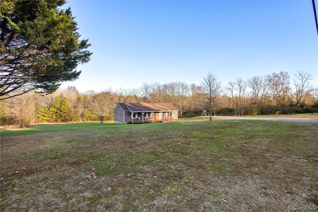 378 Three Chopt Road Manakin-Sabot, VA 23103 - Photo 3 of 34 a view of a big yard with a house
