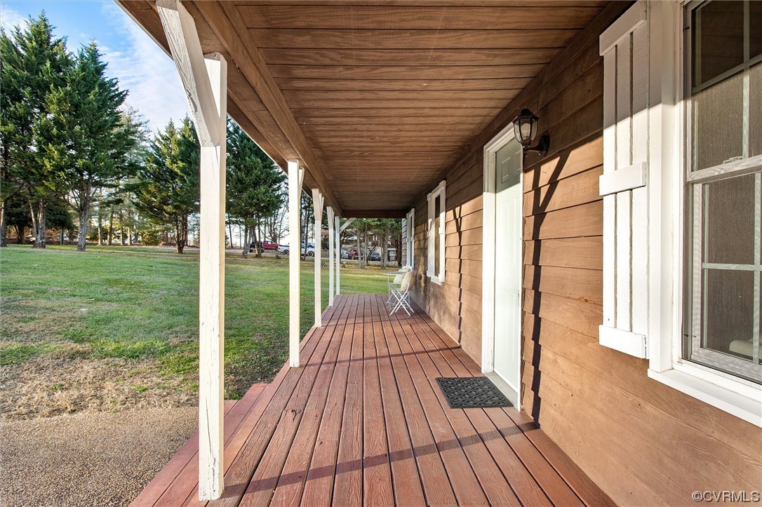 378 Three Chopt Road Manakin-Sabot, VA 23103 - Photo 6 of 34 a view of porch with wooden floor and outdoor space