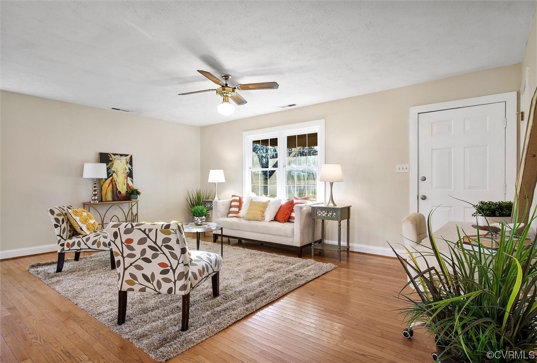 378 Three Chopt Road Manakin-Sabot, VA 23103 - Photo 10 of 34 a living room with furniture a rug and a window