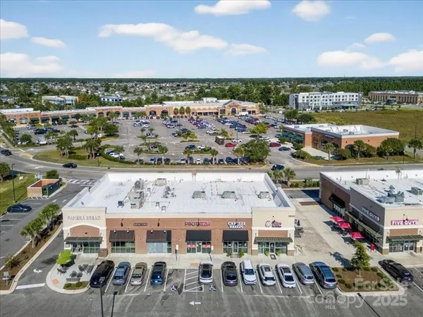 a view of city with ocean