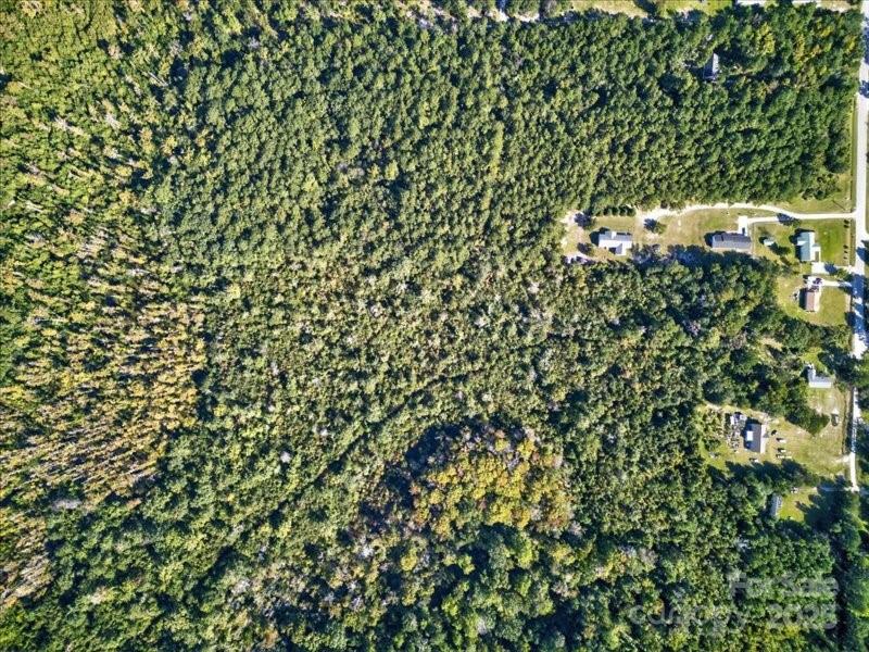 110 Unknown Name Road Southeast Leland, NC 28451 - Photo 6 of 27 a view of a house with a tree
