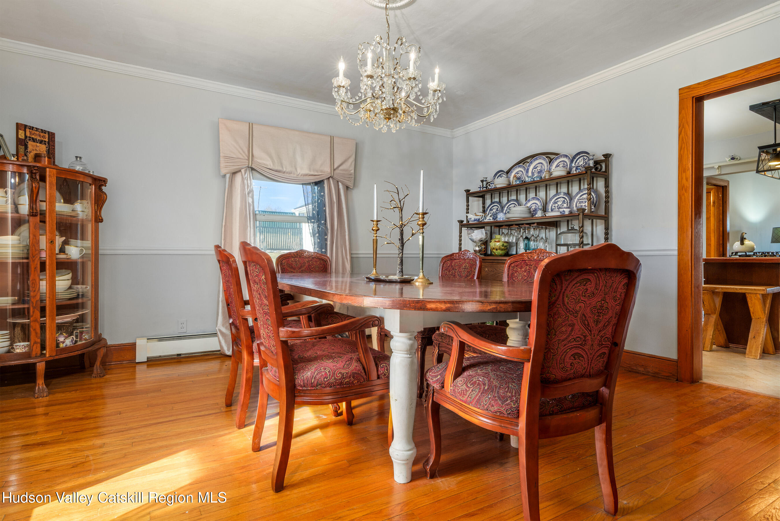 802 County Highway 3A Unadilla, NY 13849 - Photo 12 of 65 a view of a dining room with furniture and wooden floor