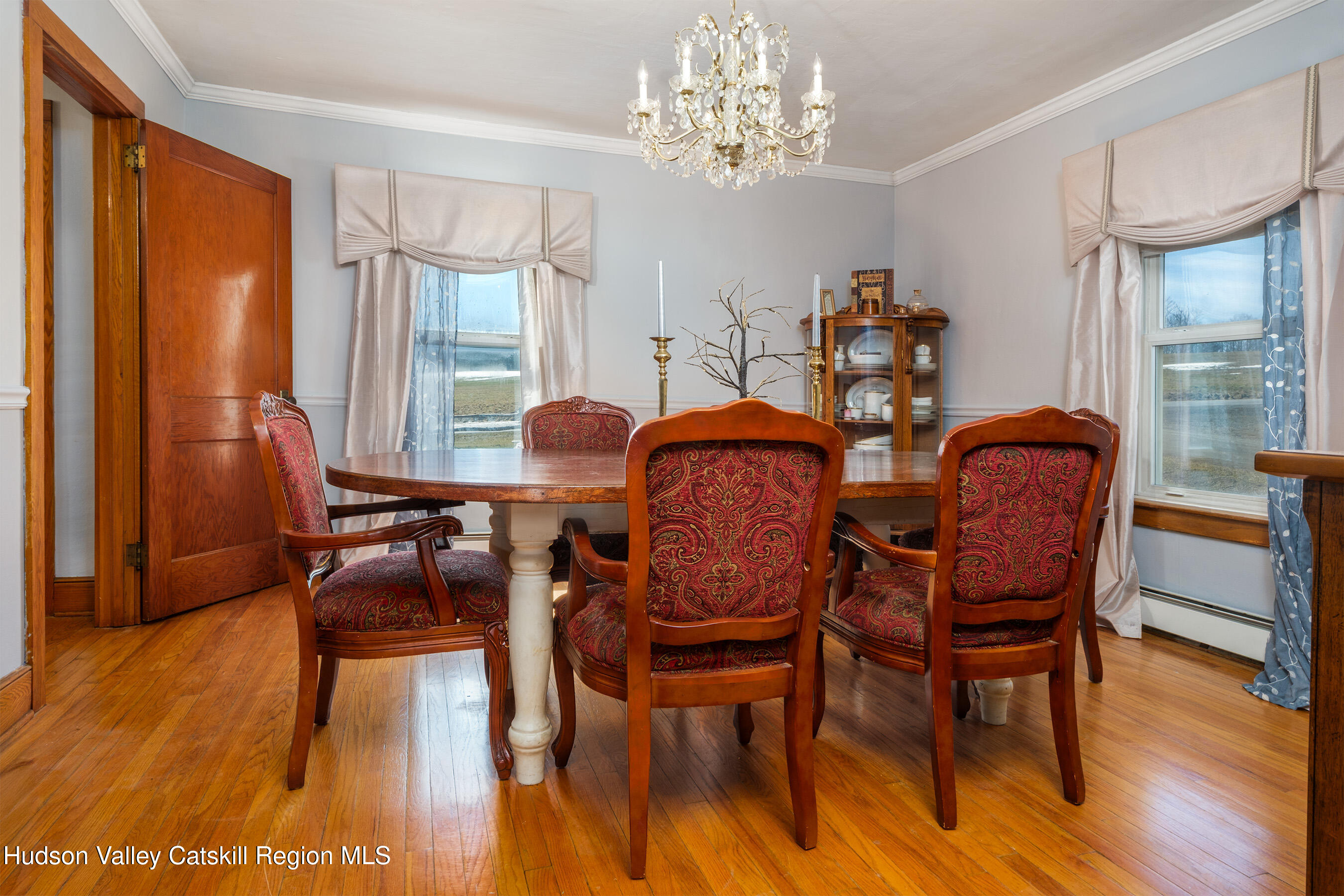 802 County Highway 3A Unadilla, NY 13849 - Photo 13 of 65 a dining room with furniture a chandelier and wooden floor