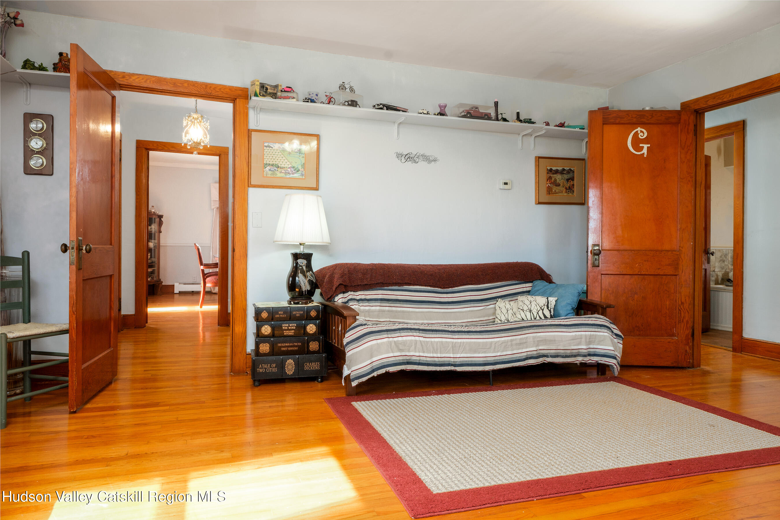 802 County Highway 3A Unadilla, NY 13849 - Photo 16 of 65 a bedroom with a bed and wooden floor