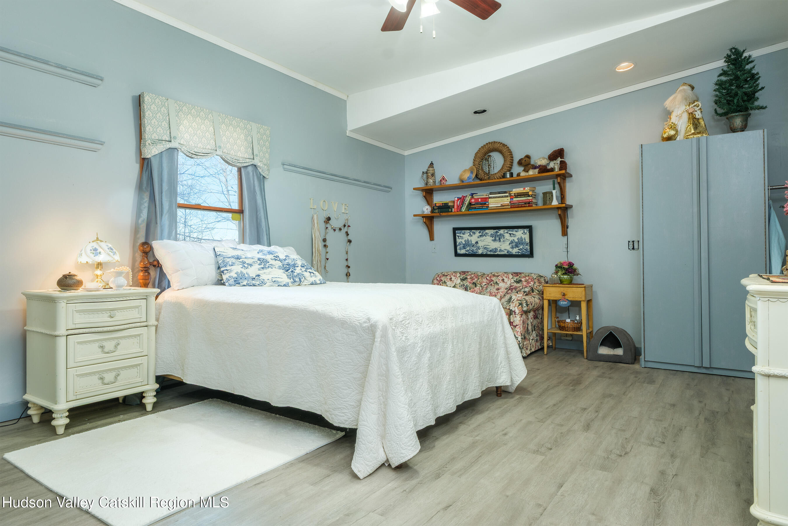 802 County Highway 3A Unadilla, NY 13849 - Photo 30 of 65 a bedroom with a bed and a chandelier