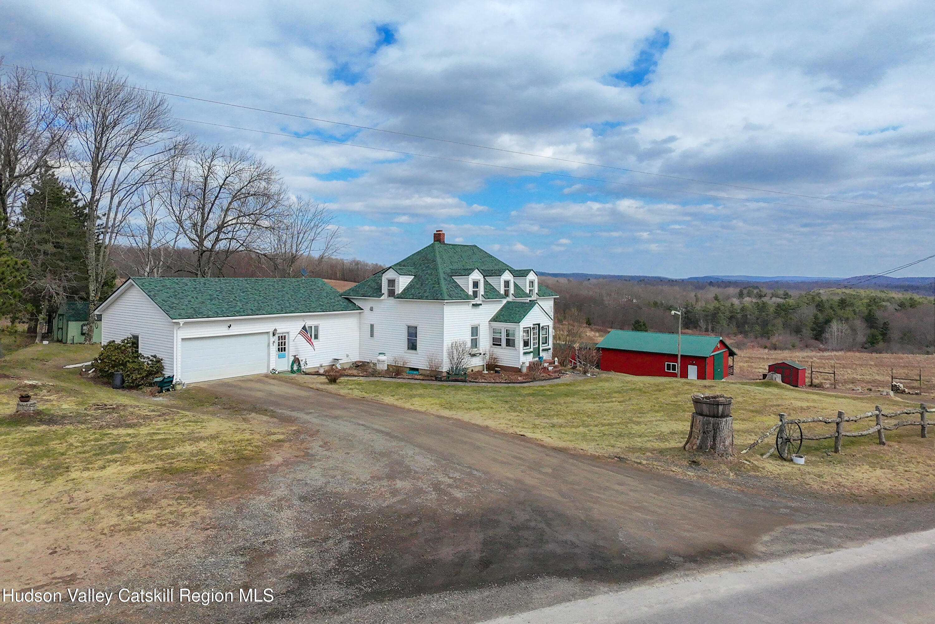 802 County Highway 3A Unadilla, NY 13849 - Photo 3 of 65 a view of a house with a yard and garage