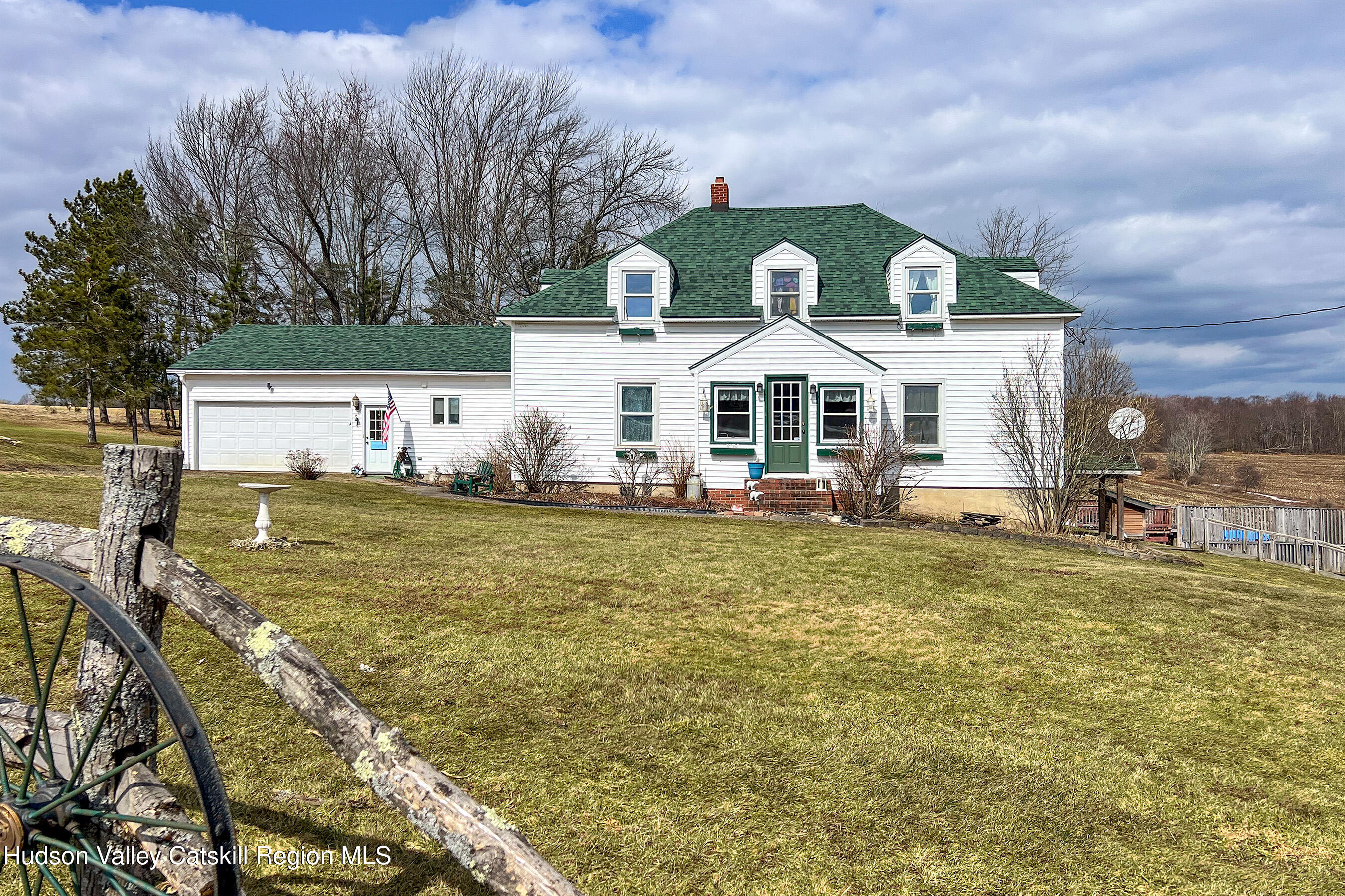 802 County Highway 3A Unadilla, NY 13849 - Photo 4 of 65 a front view of a house with garden