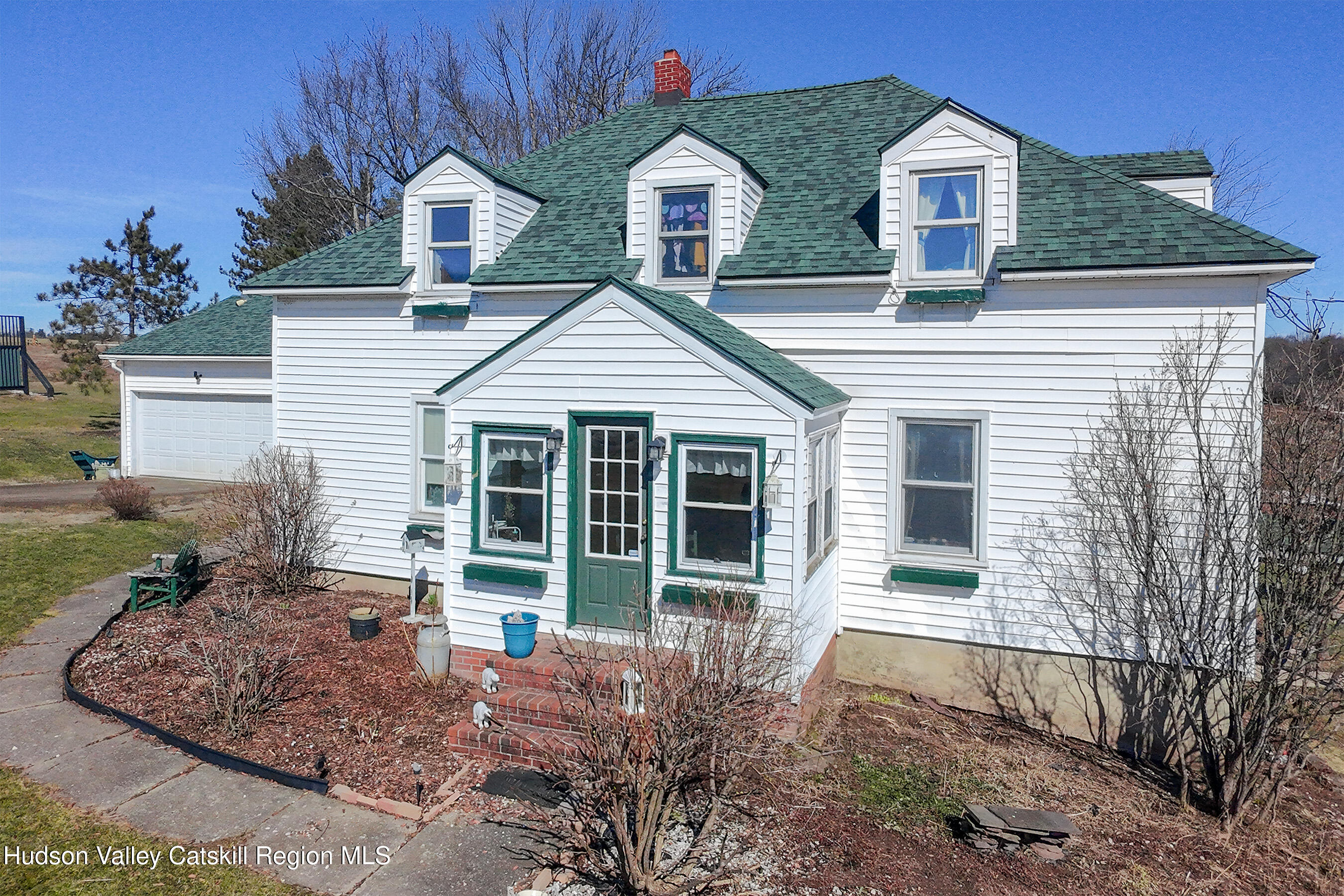 802 County Highway 3A Unadilla, NY 13849 - Photo 64 of 65 a front view of a house with garden
