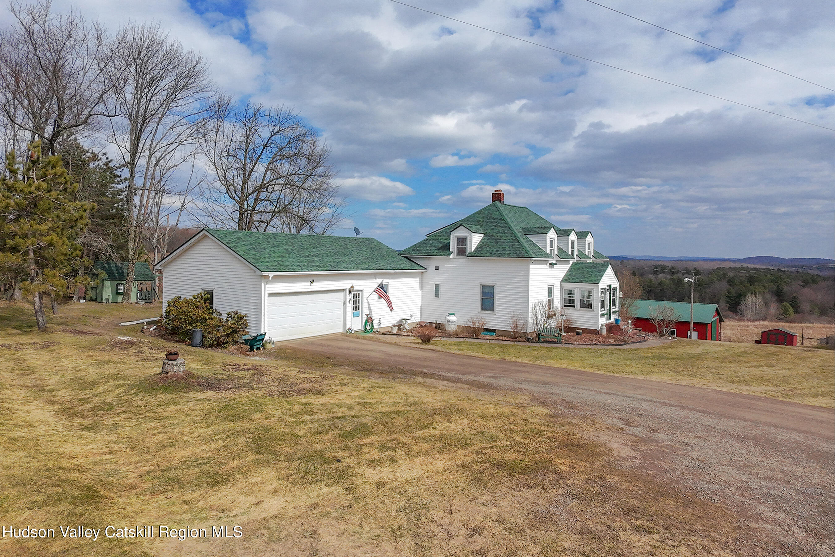 802 County Highway 3A Unadilla, NY 13849 - Photo 7 of 65 a view of a house with a yard and garage