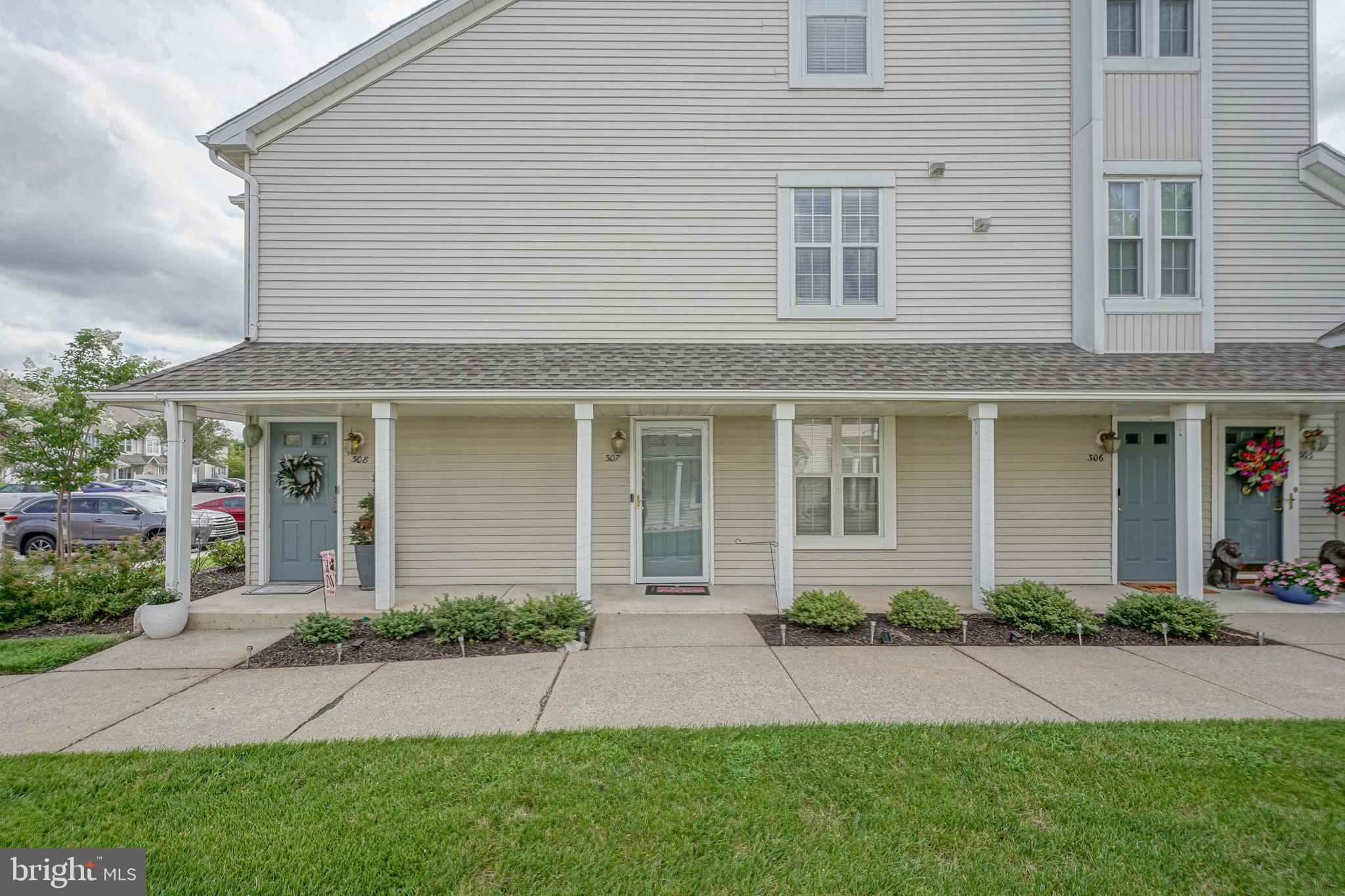 307 Wharton Road Mount Laurel, NJ 08054 - Photo 1 of 14 front view of a house with a yard