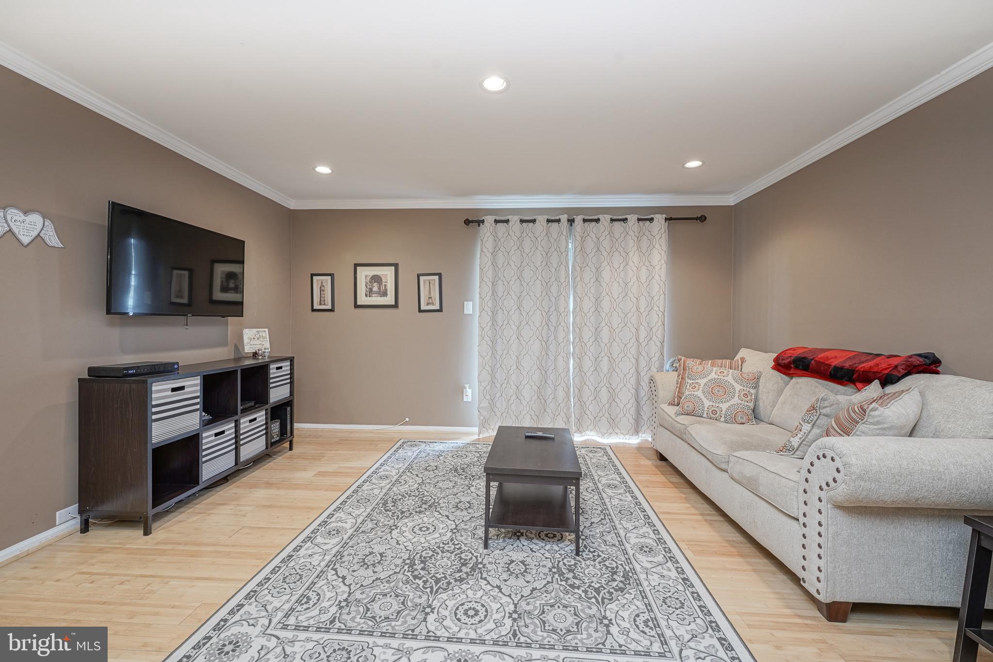 307 Wharton Road Mount Laurel, NJ 08054 - Photo 4 of 14 a living room with furniture and a flat screen tv