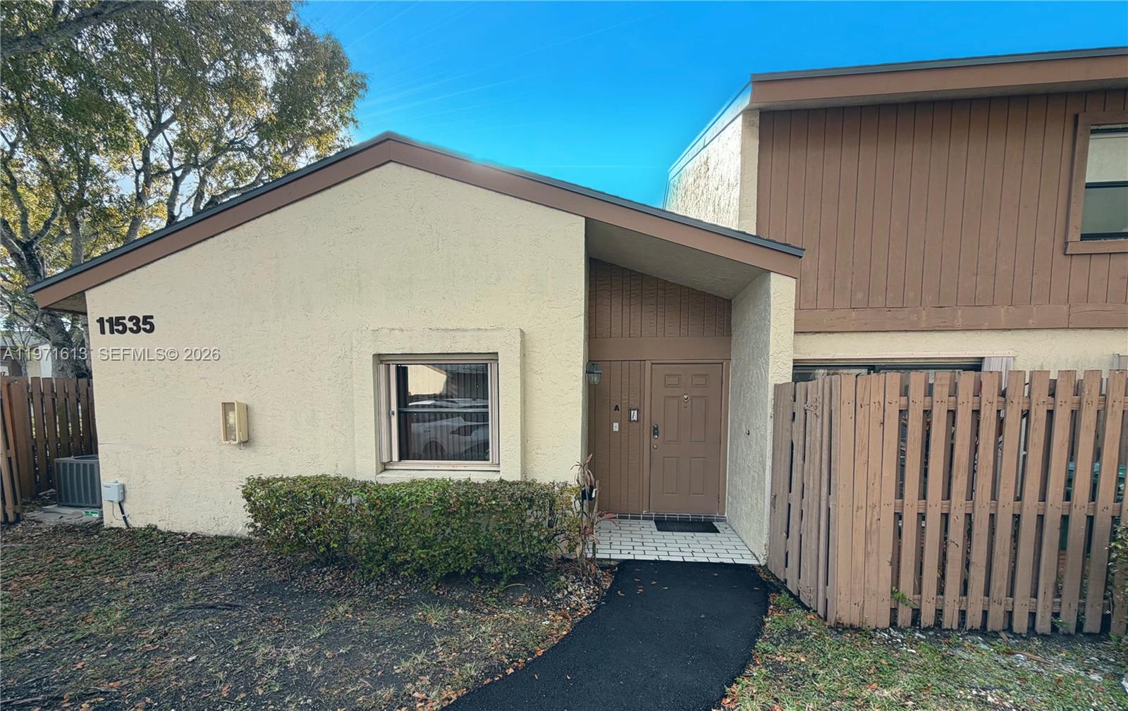 11535 Southwest 109th Road, Unit 22A Miami, FL 33176 - Photo 1 of 41 Property Front with fenced in patio