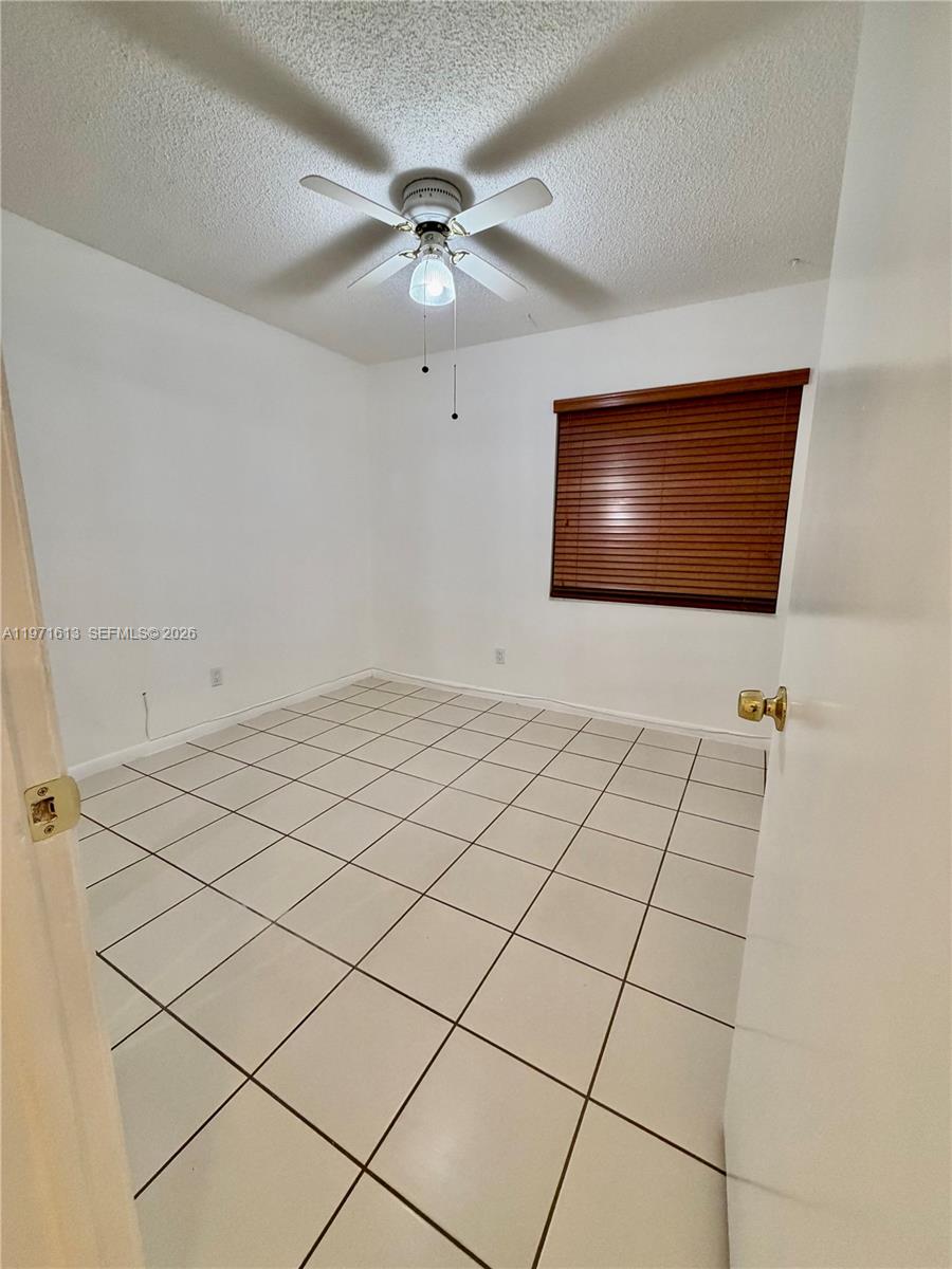 11535 Southwest 109th Road, Unit 22A Miami, FL 33176 - Photo 15 of 41 Secondary bedroom