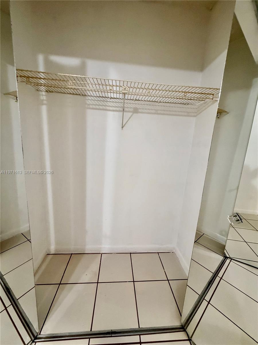 11535 Southwest 109th Road, Unit 22A Miami, FL 33176 - Photo 17 of 41 Secondary bedroom sizable closet