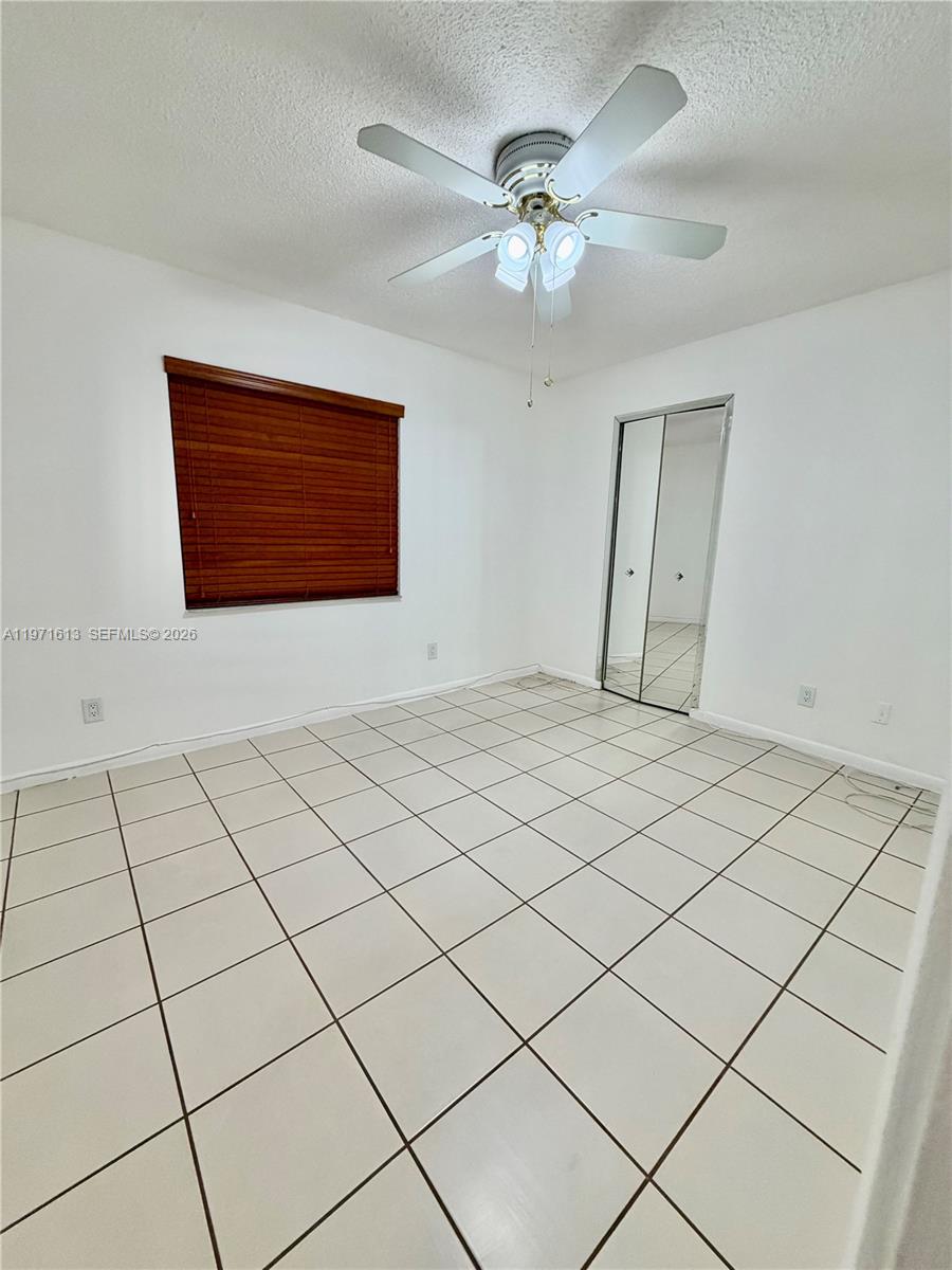 11535 Southwest 109th Road, Unit 22A Miami, FL 33176 - Photo 18 of 41 Secondary bedroom with walk-in closet