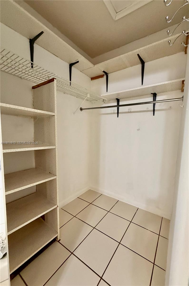 11535 Southwest 109th Road, Unit 22A Miami, FL 33176 - Photo 19 of 41 Secondary bedroom walk-in closet