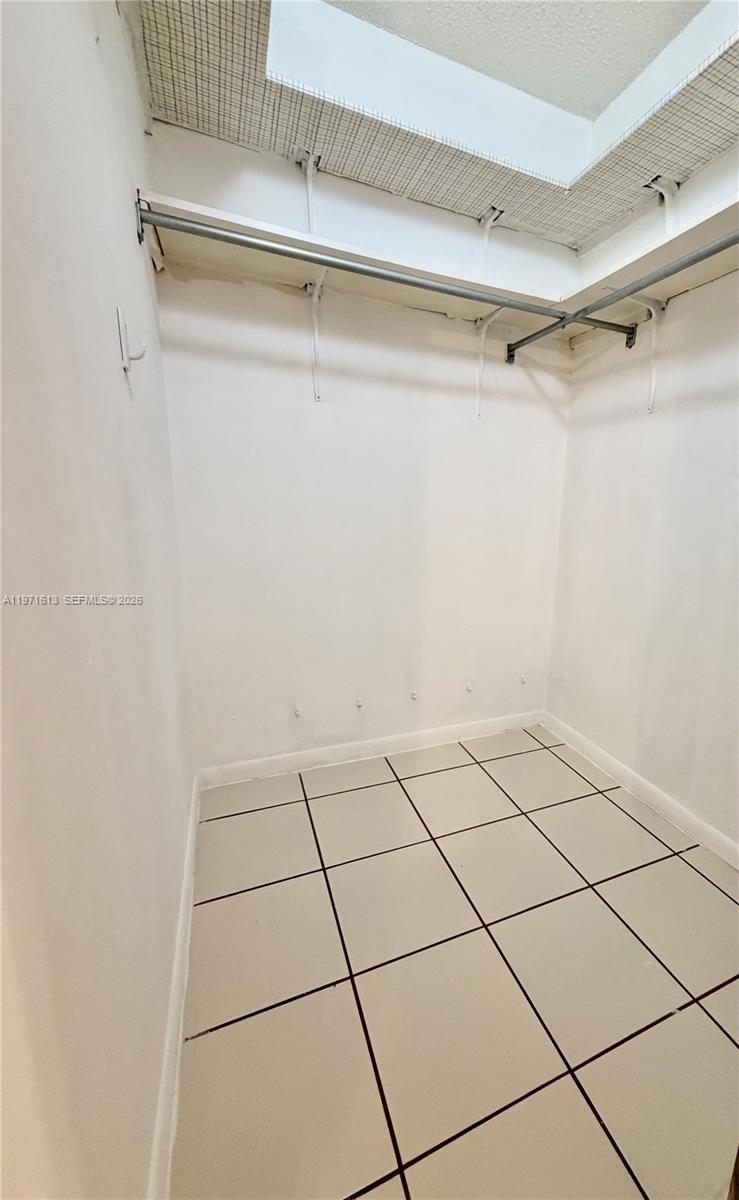 11535 Southwest 109th Road, Unit 22A Miami, FL 33176 - Photo 22 of 41 Main bedroom walk-in closet