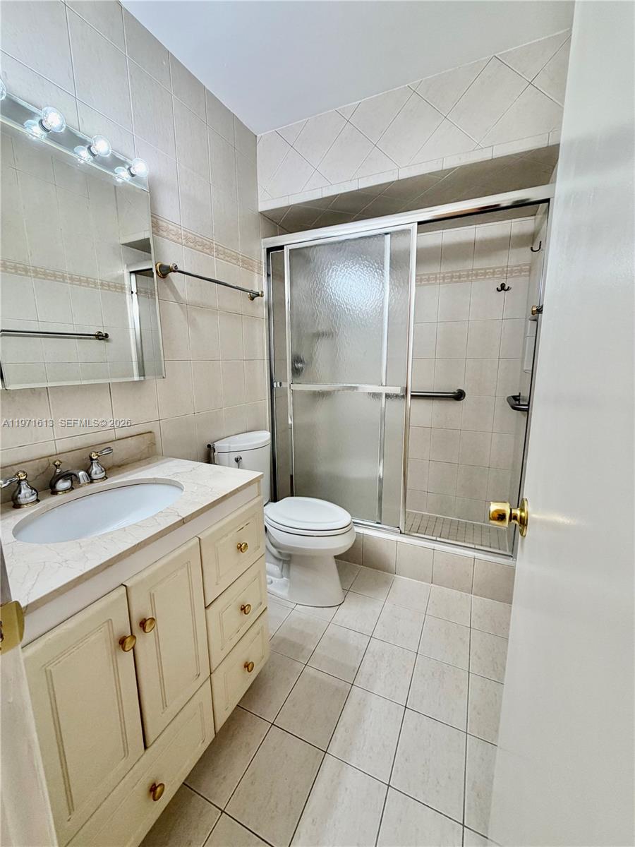 11535 Southwest 109th Road, Unit 22A Miami, FL 33176 - Photo 23 of 41 Main bedroom bathroom with shower