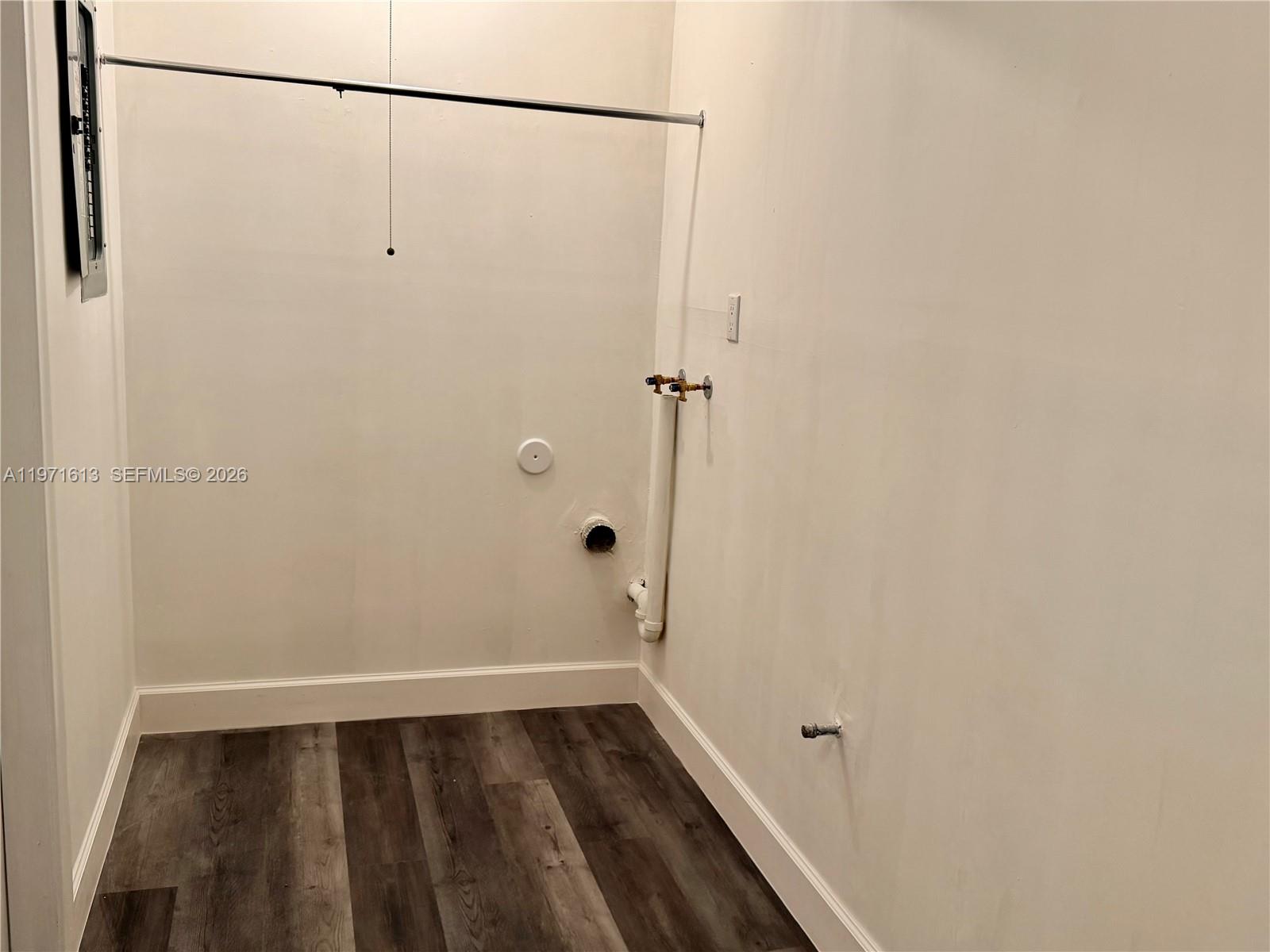 11535 Southwest 109th Road, Unit 22A Miami, FL 33176 - Photo 28 of 41 Washer/Dryer hook-up area of large laundry/utility/storage room accessible from family room