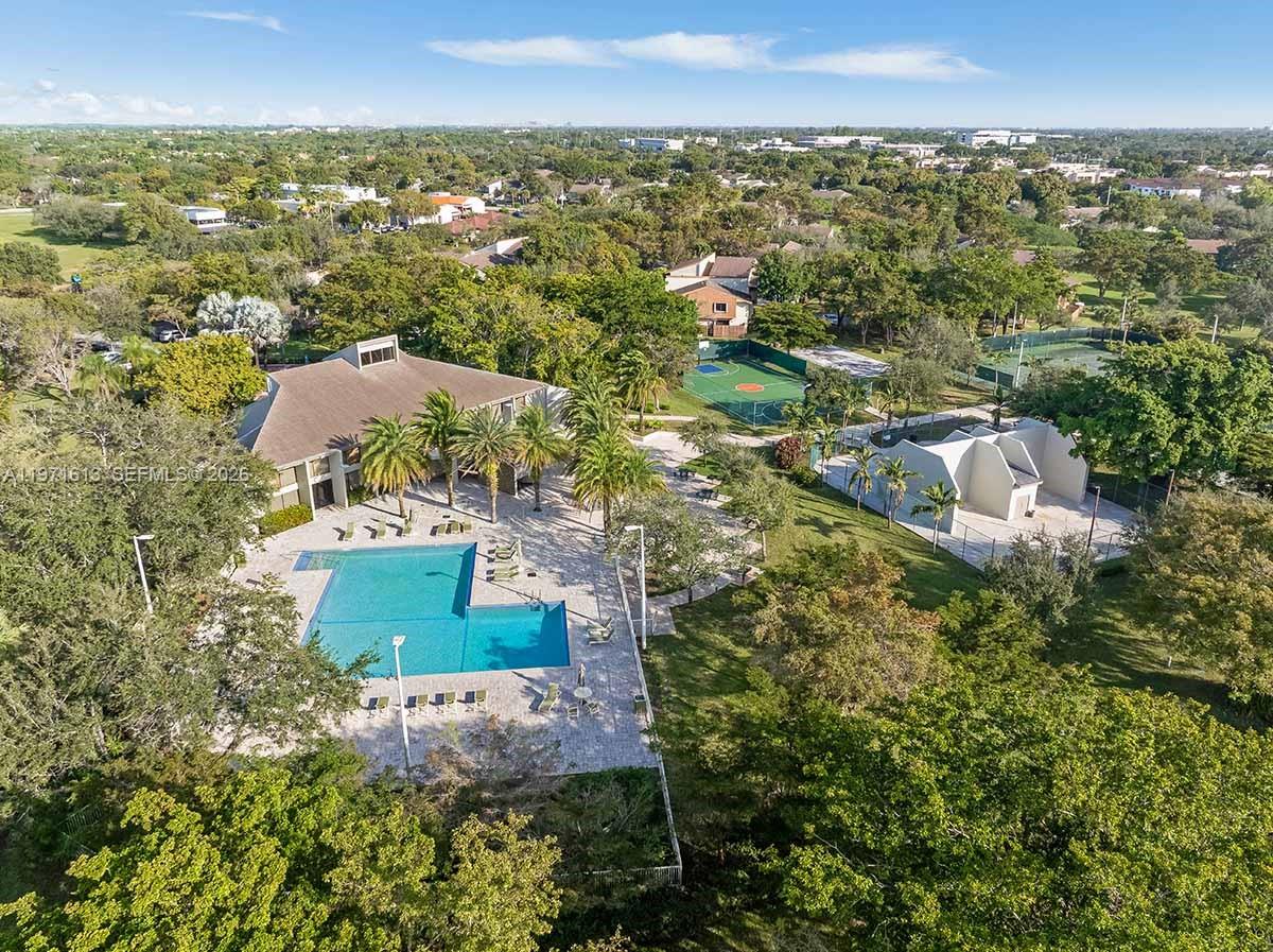 11535 Southwest 109th Road, Unit 22A Miami, FL 33176 - Photo 32 of 41 Community Clubhouse, Pool, and Sports Courts