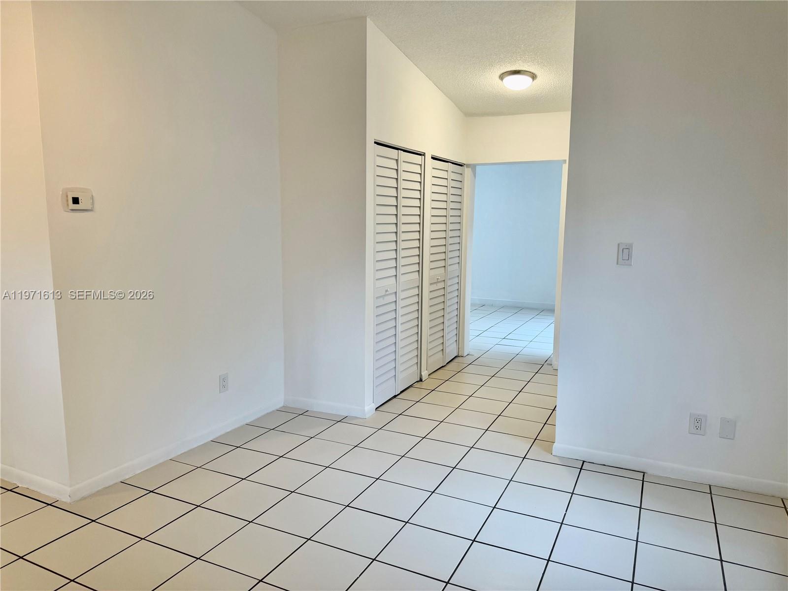 11535 Southwest 109th Road, Unit 22A Miami, FL 33176 - Photo 5 of 41 Living Room area flowing from foyer entrance