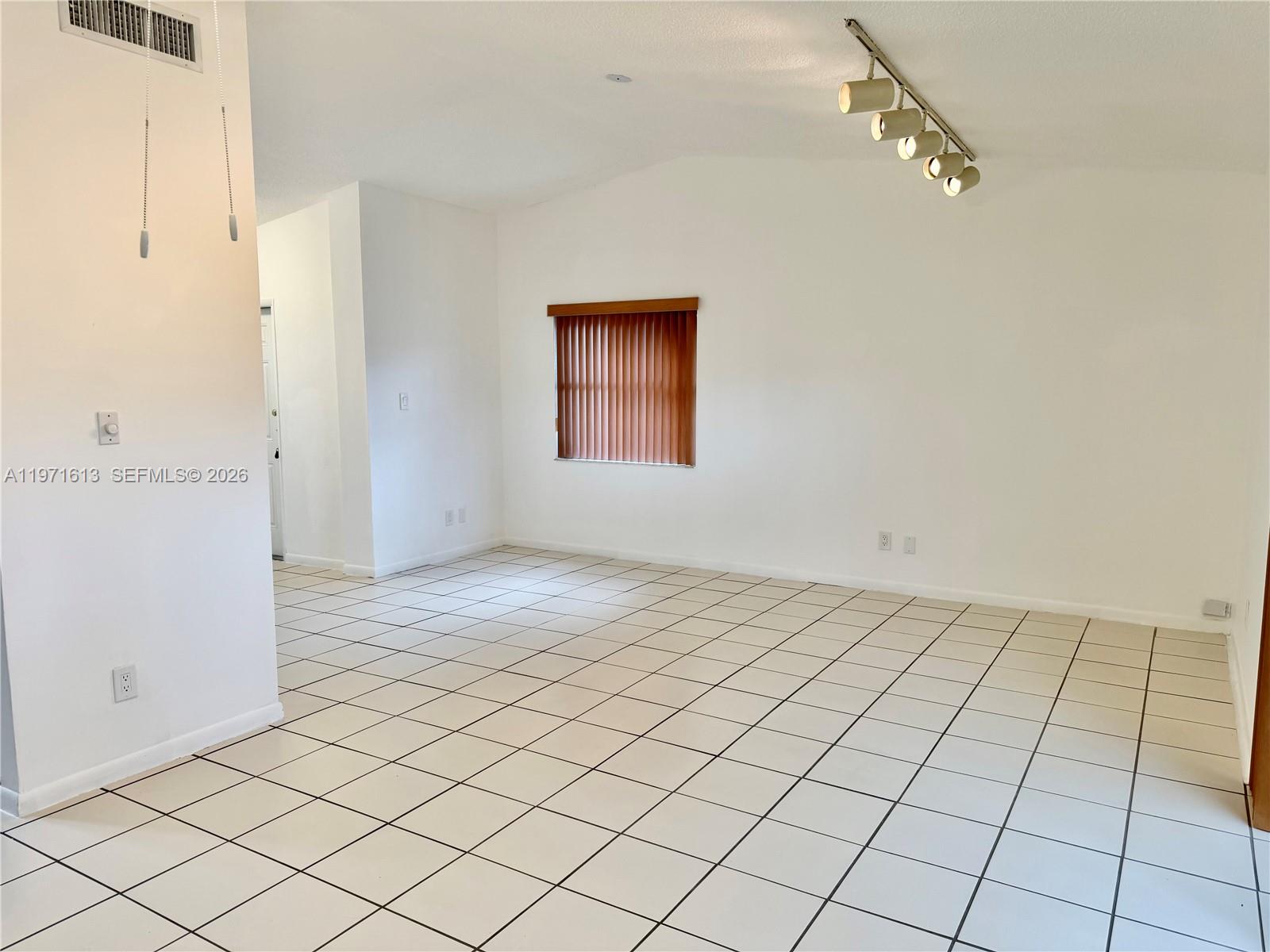 11535 Southwest 109th Road, Unit 22A Miami, FL 33176 - Photo 8 of 41 Dining/Living Area