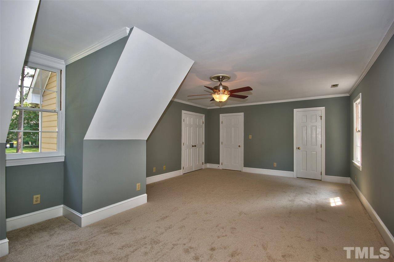 304 Key Court Raleigh, NC 27614 - Photo 13 of 25 a view of an empty room with a window