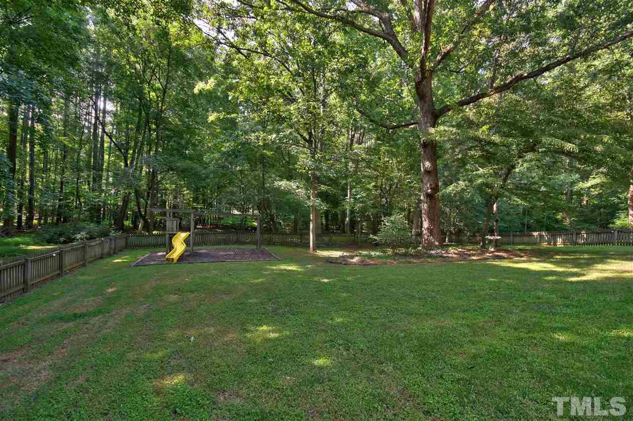 304 Key Court Raleigh, NC 27614 - Photo 21 of 25 a view of a park with large trees