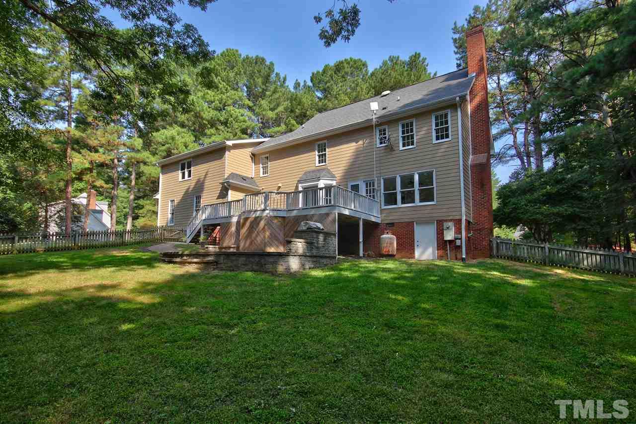 304 Key Court Raleigh, NC 27614 - Photo 22 of 25 a front view of a house with a garden