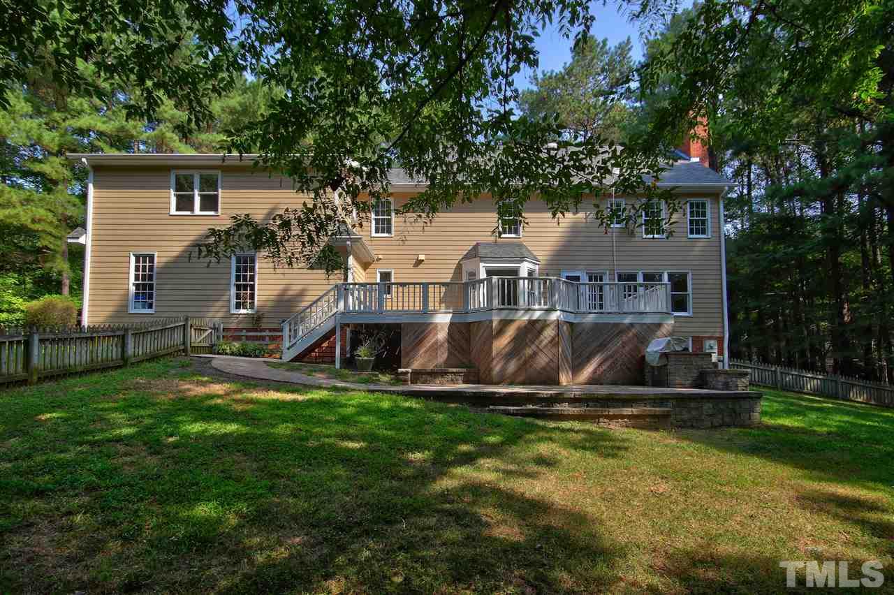 304 Key Court Raleigh, NC 27614 - Photo 23 of 25 a front view of house with yard and green space