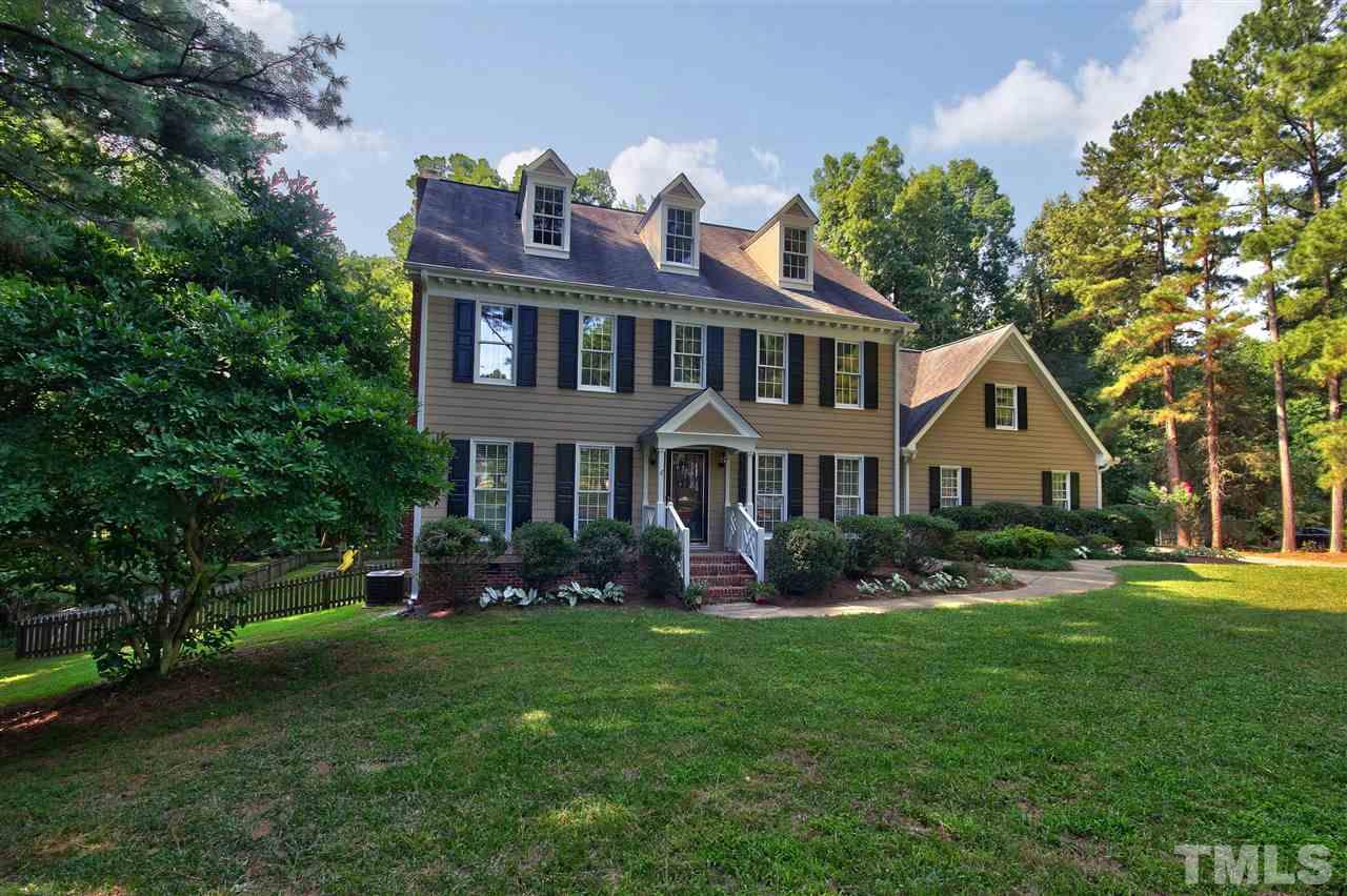 304 Key Court Raleigh, NC 27614 - Photo 25 of 25 a front view of a house with a yard and green space