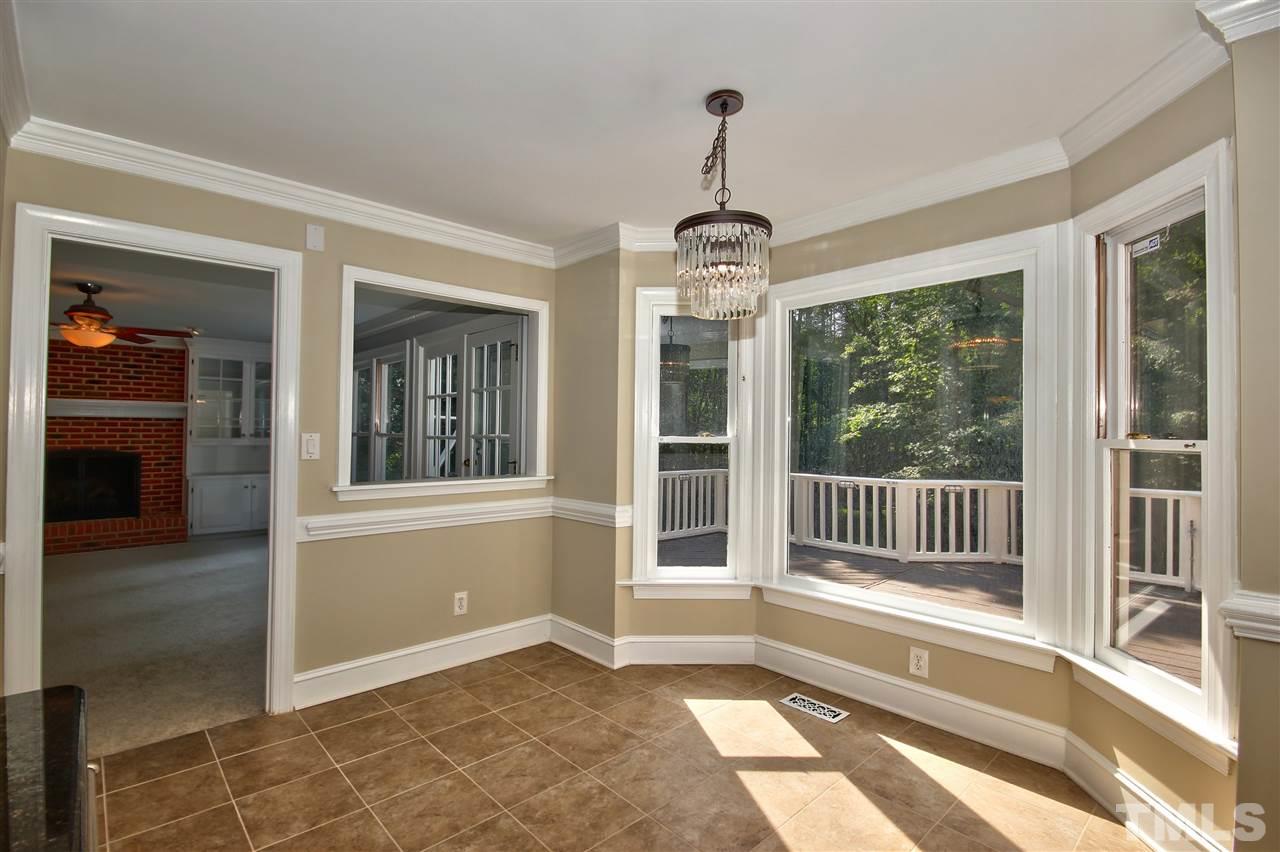 304 Key Court Raleigh, NC 27614 - Photo 9 of 25 a view of empty room with windows