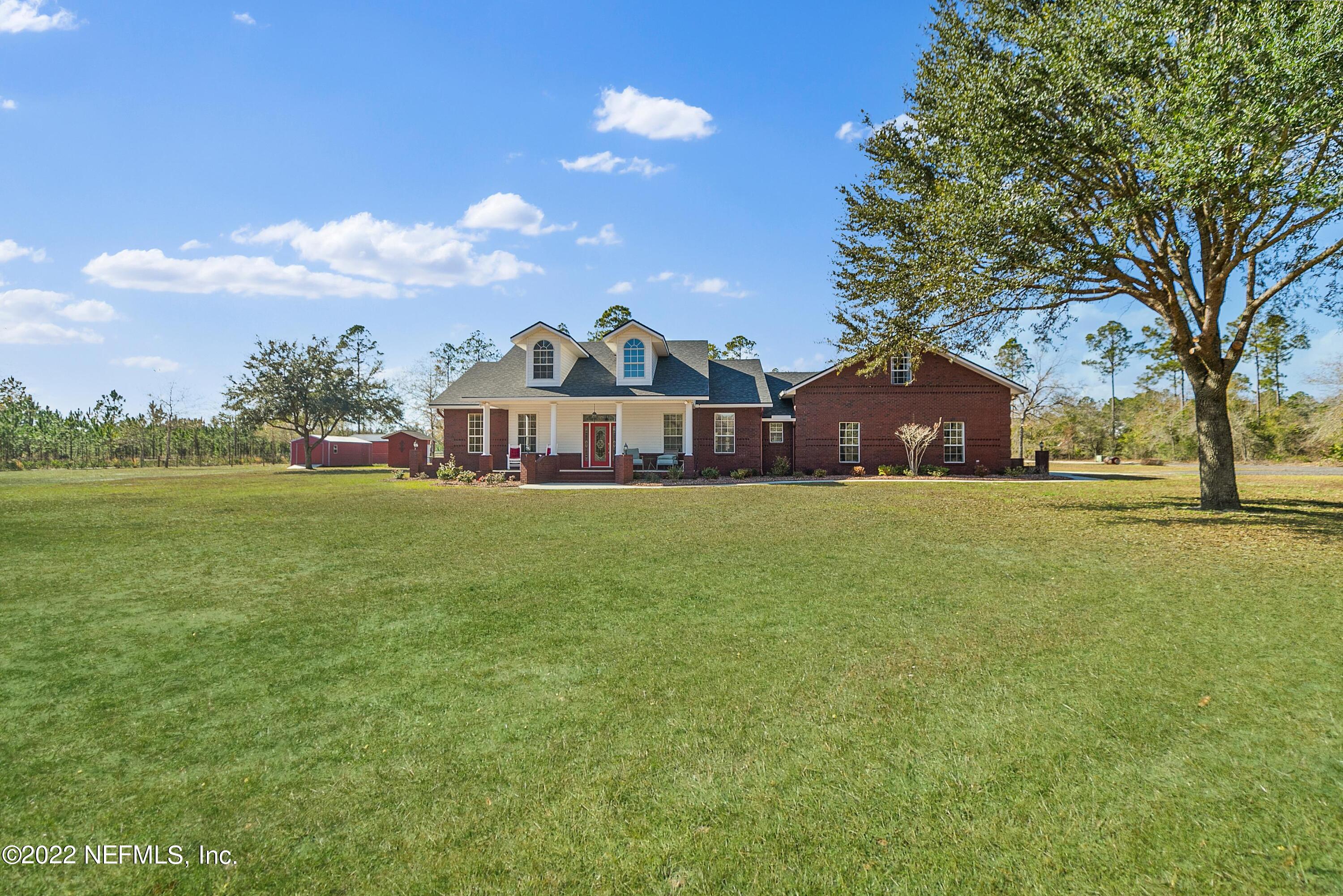 a front view of house with yard