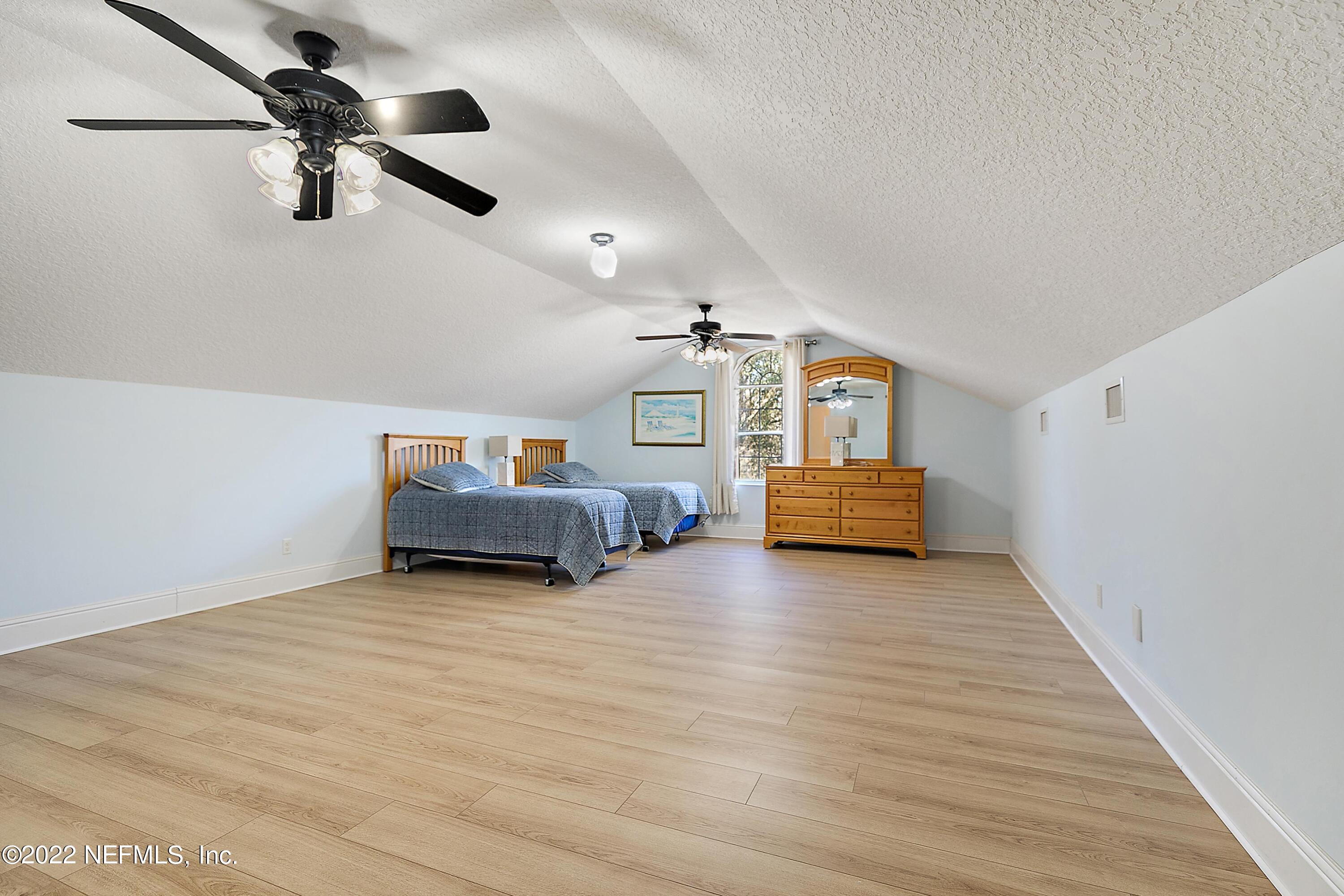 14394 Bob Burnsed Road Glen St. Mary, FL 32040 - Photo 20 of 36 a room with furniture and ceiling fan